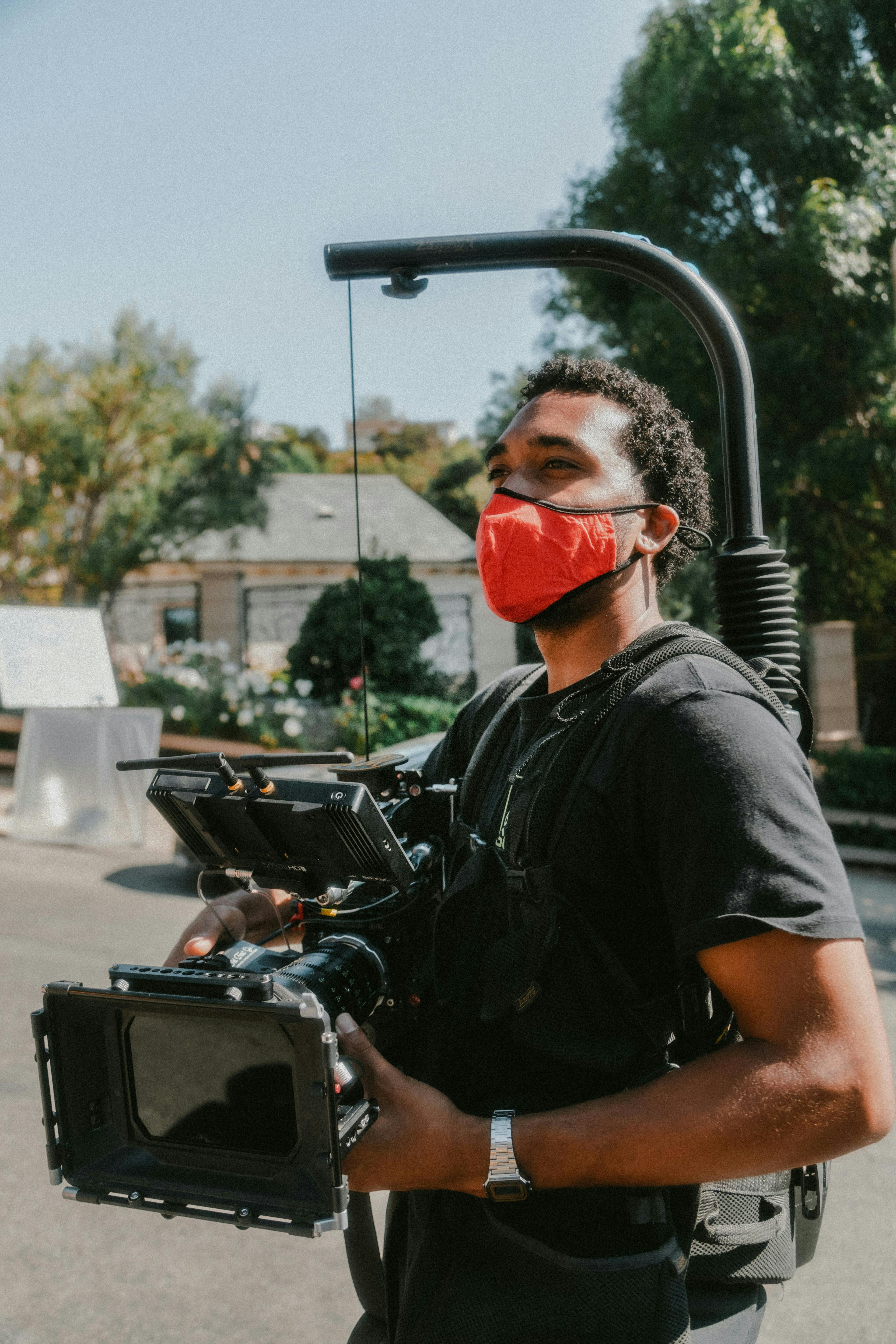 man holding video camera. 